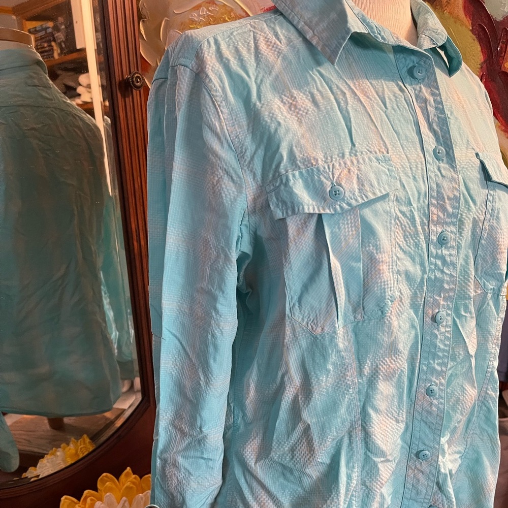 Very fresh and light fabric.  Button down shirt.  Beautiful